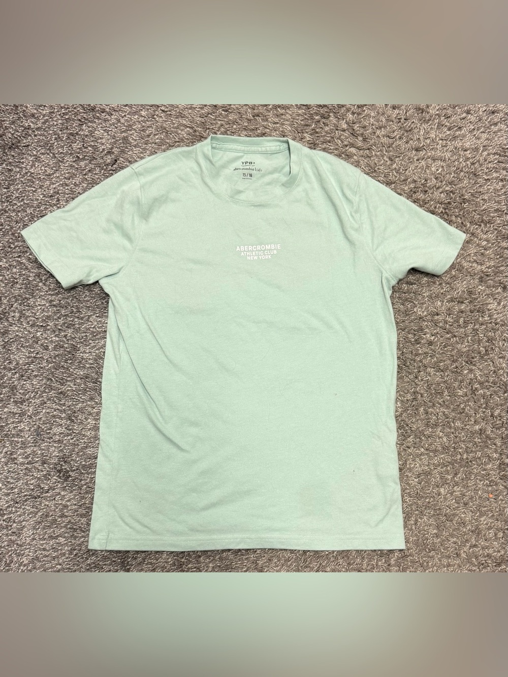 NWOT Boys Abercrombie Kids X YPB Football SS Tee, Size 15/16, pastel green.